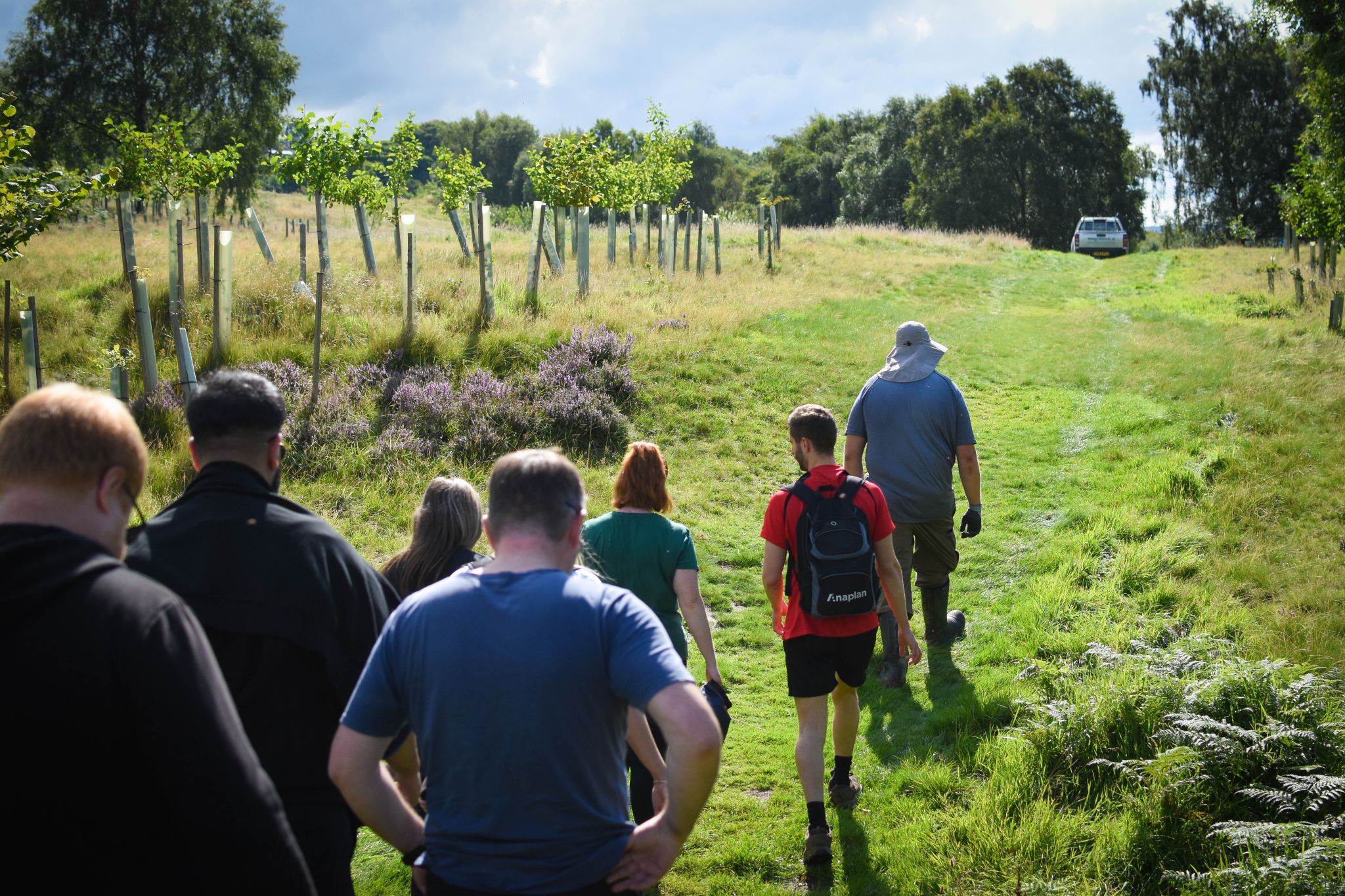 The team heading out into the woods.